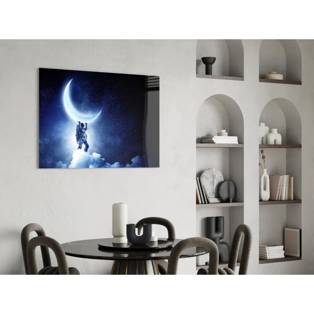 Astronaut touching glowing crescent moon in glass wall art print