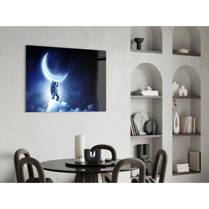 Astronaut touching glowing crescent moon in glass wall art print