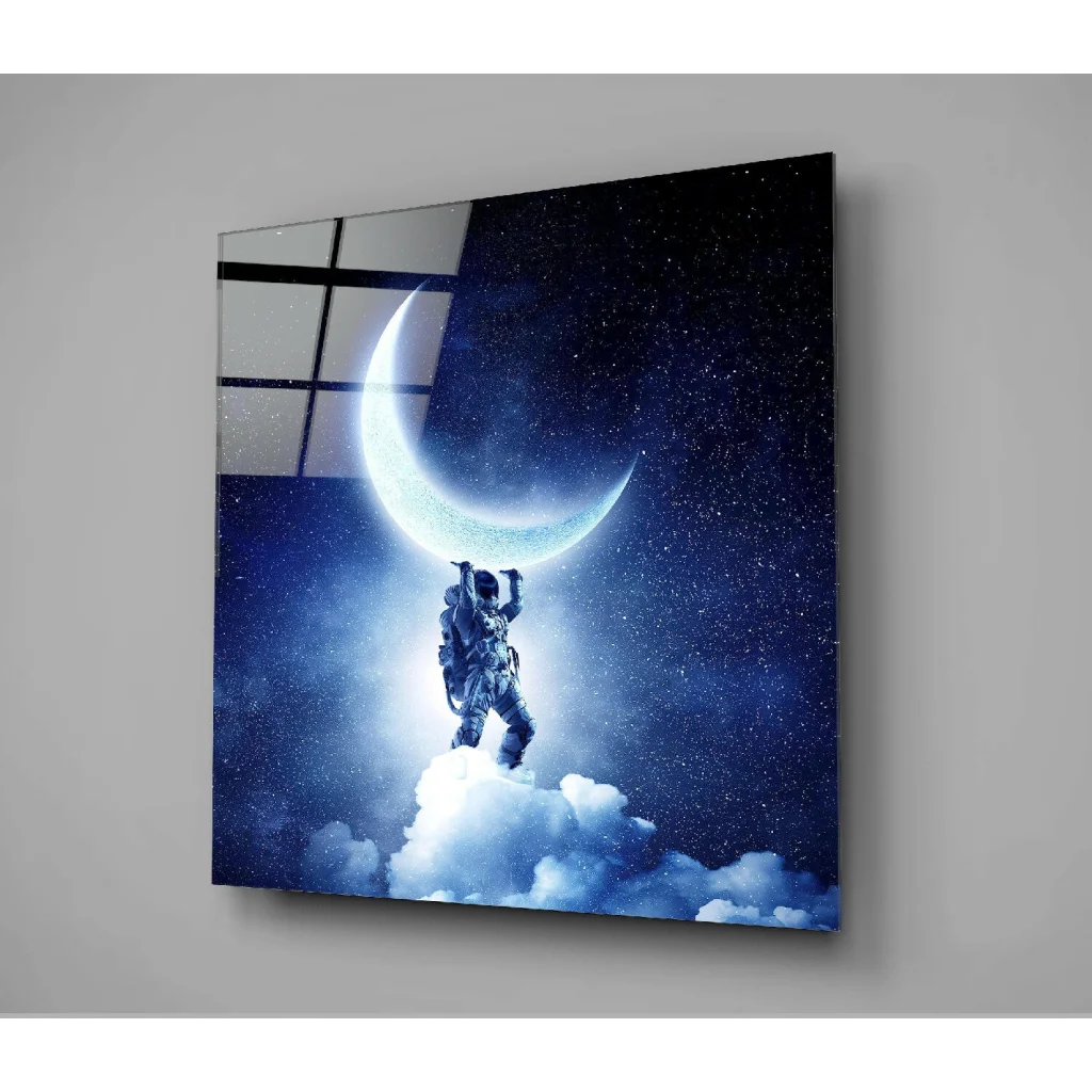 Blue-toned astronaut moon glass wall art with starry night clouds