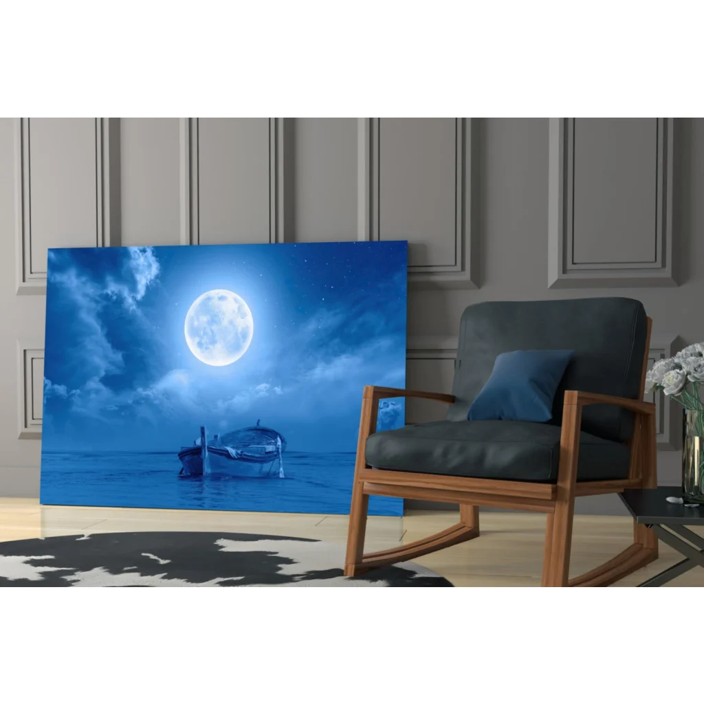 Serene blue moonlit boat canvas wall art with full moon over calm waters