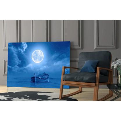 Serene blue moonlit boat canvas wall art with full moon over calm waters