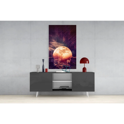 Vibrant orange moon wall art canvas with purple night sky above gray console
