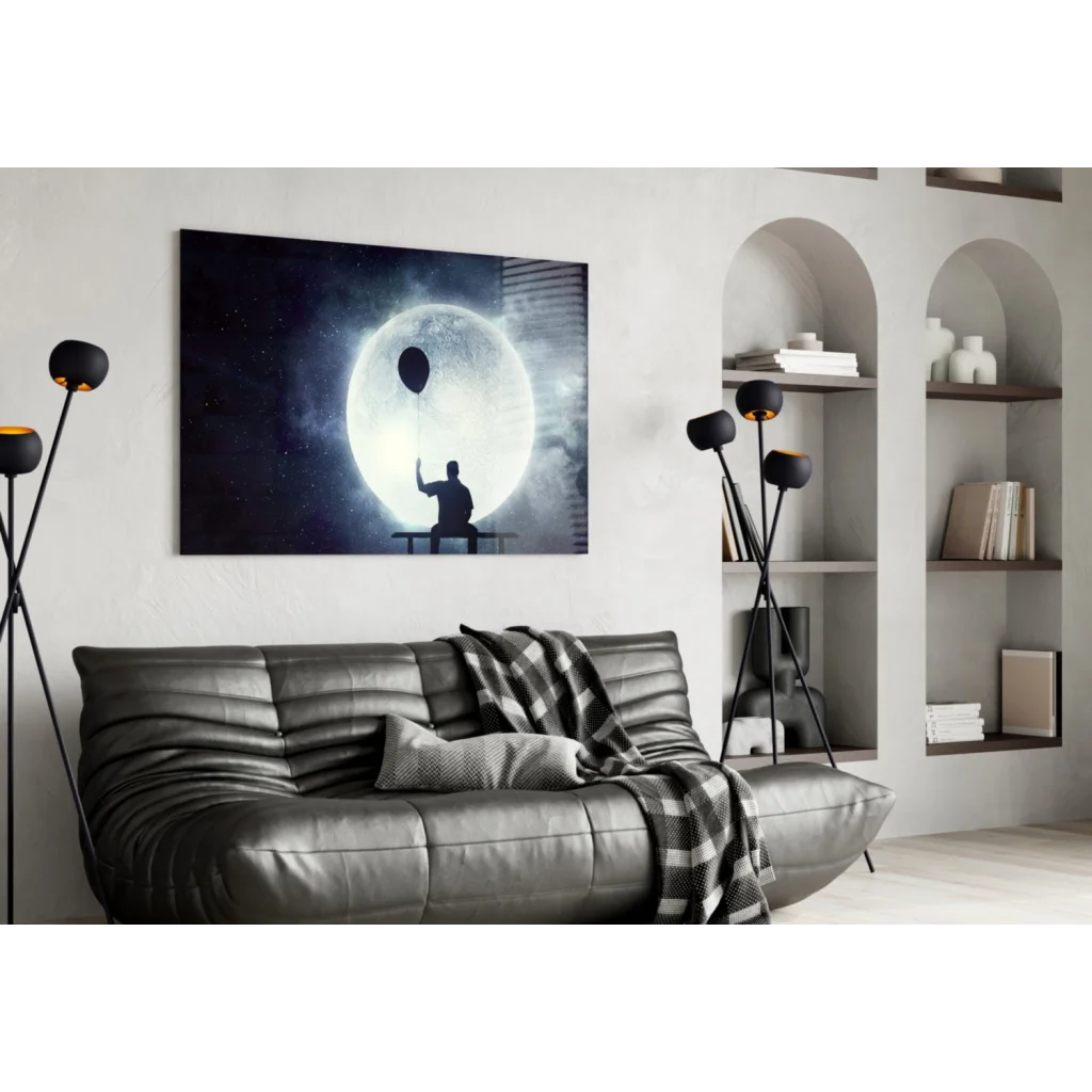Silhouette of dreamer holding balloon under glowing moon, canvas wall art print