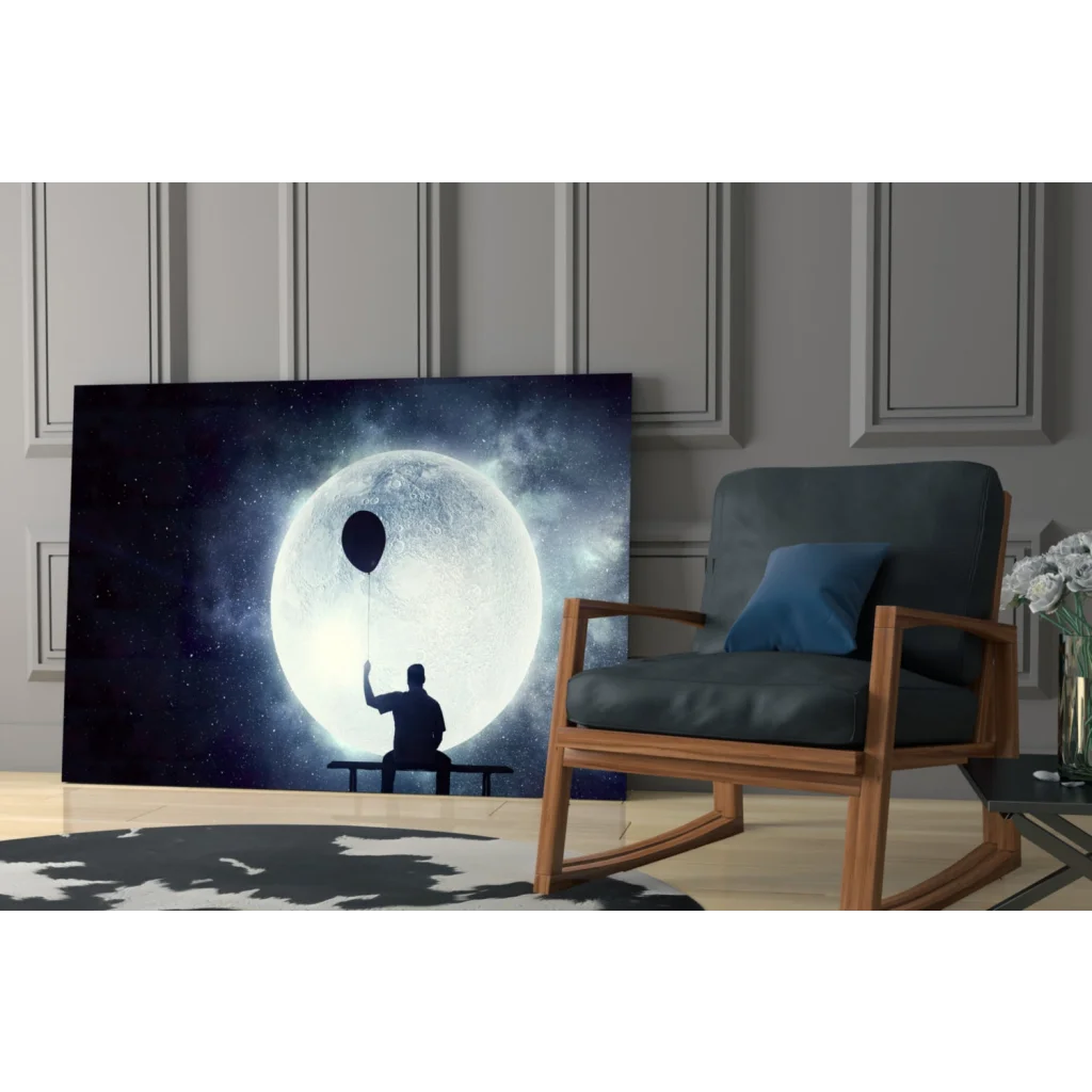 Silhouette of dreamer on bench with balloon under luminous moon, canvas wall art