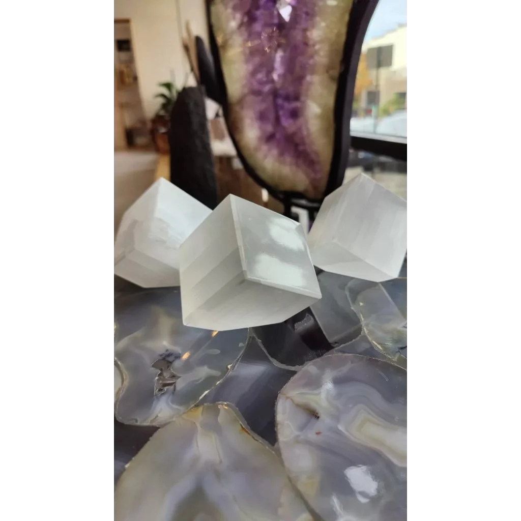 Moroccan selenite crystal cubes 470g on agate slab