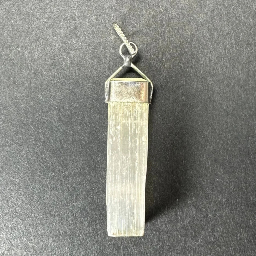 Translucent pale greenish selenite pendant with sterling silver clasp