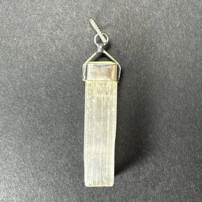 Translucent pale greenish selenite pendant with sterling silver clasp