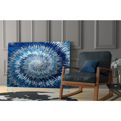 Stunning blue radial burst glass wall art with shimmering textured patterns
