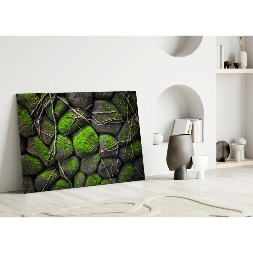 Mossy stone glass wall art with vibrant green moss on dark gray rocks