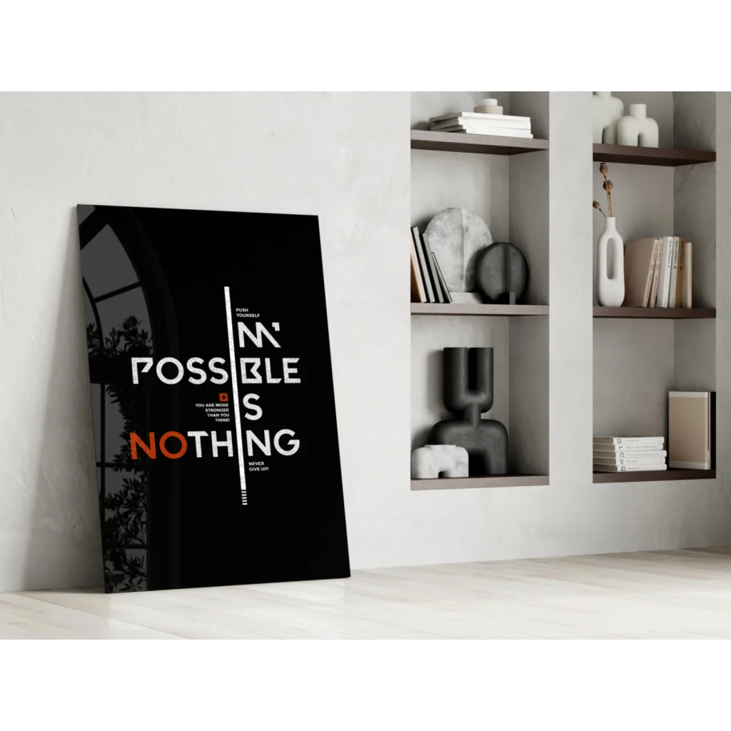 Black canvas wall art with bold Possible is Nothing text in white orange