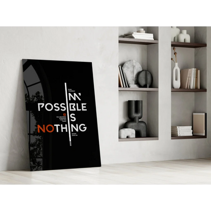 Black canvas wall art with bold Possible is Nothing text in white orange