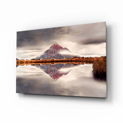 Majestic pink mountain glass wall art with water reflection