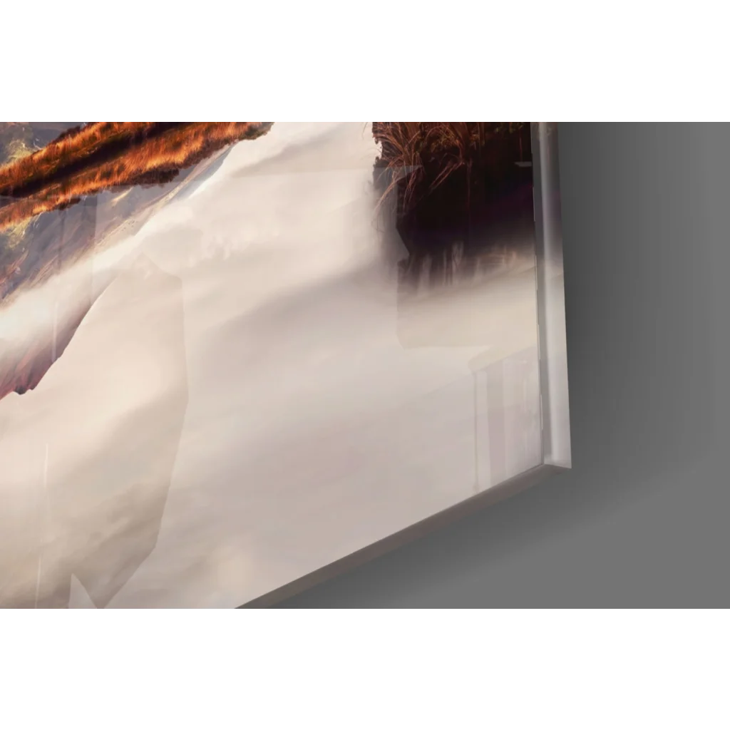 Stunning pink mountain glass wall art with snowy peaks, warm trees, water reflection