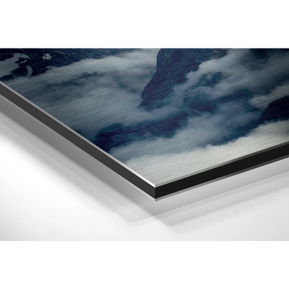 Sleek brushed aluminium dibond print of dramatic mountain with swirling clouds