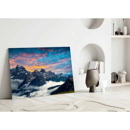 Stunning mountain sunset glass wall art with dramatic orange pink blue sky