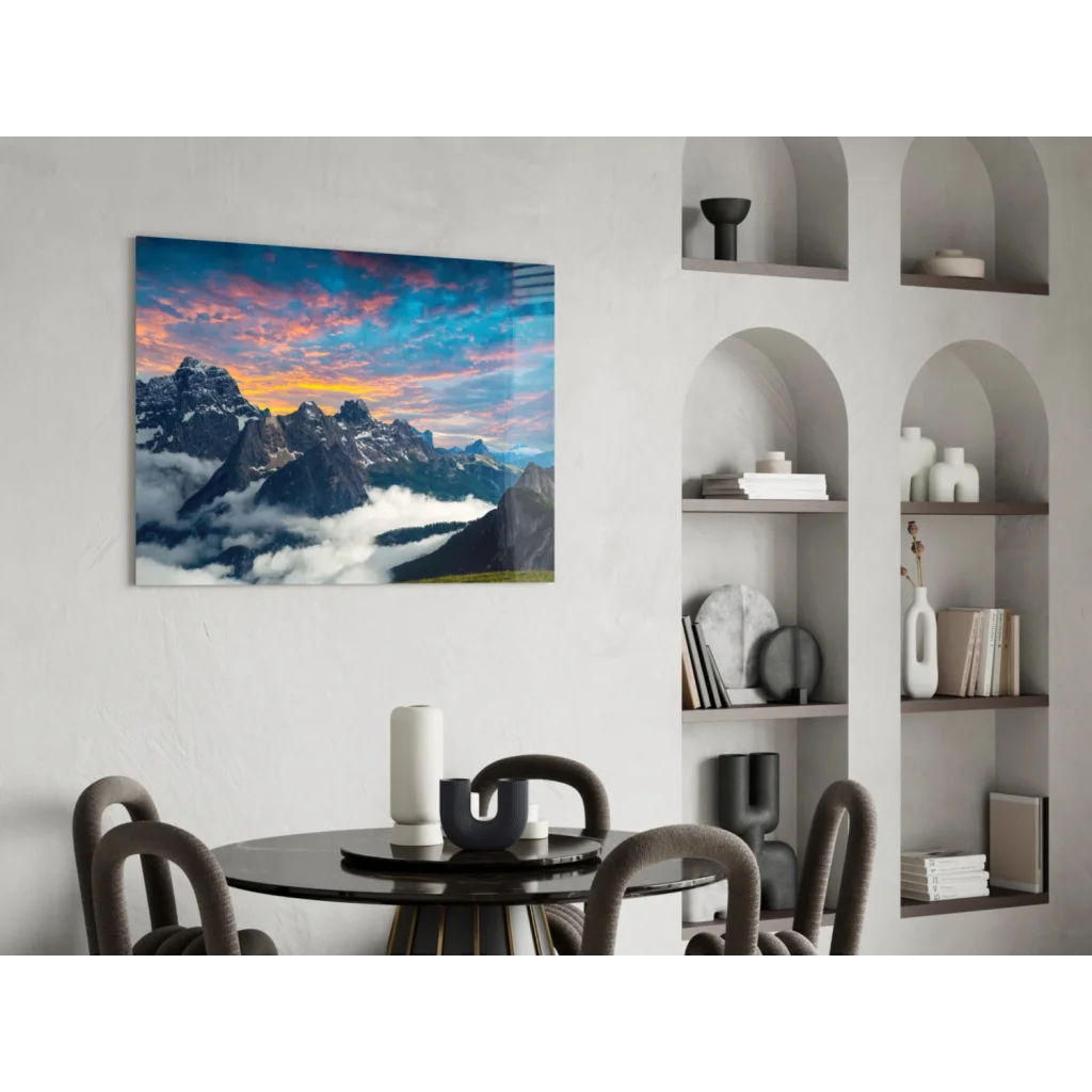 Vibrant glass wall art of mountain sunset with dramatic colorful sky