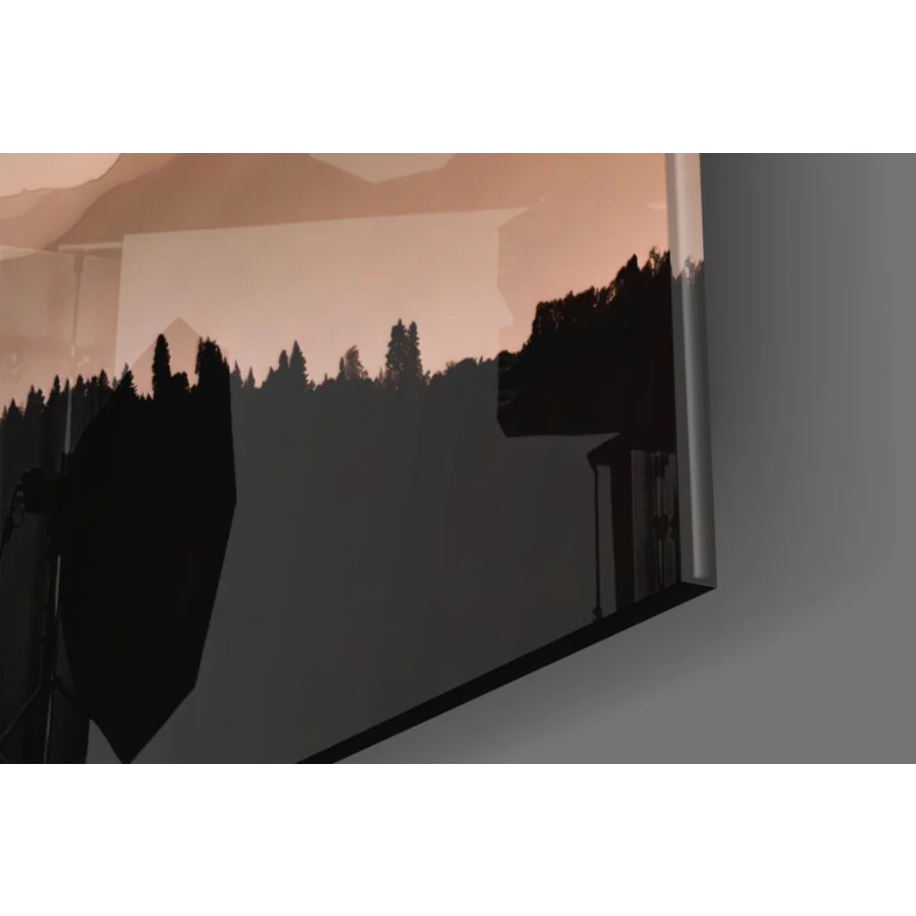 Minimalist sunset mountain peaks glass wall art with silhouetted trees