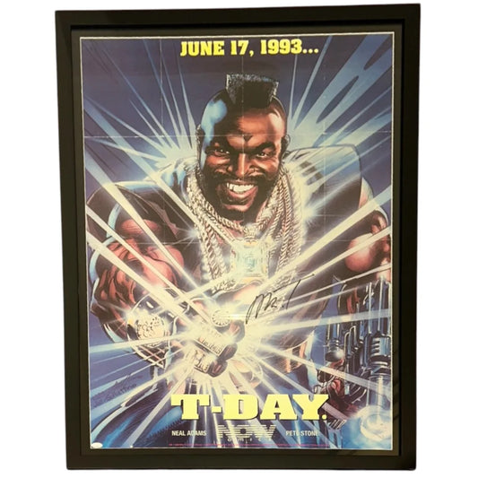 Mr. T autographed vintage framed poster of muscular mohawked man with gold chains holding footballs