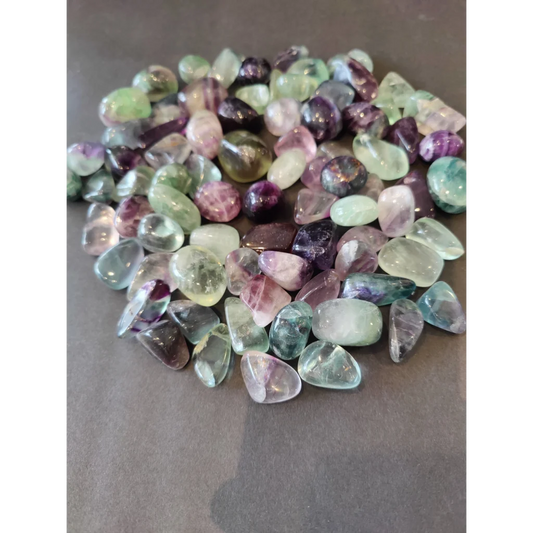 Multi color rainbow fluorite tumbled stones in green, purple, pink from China