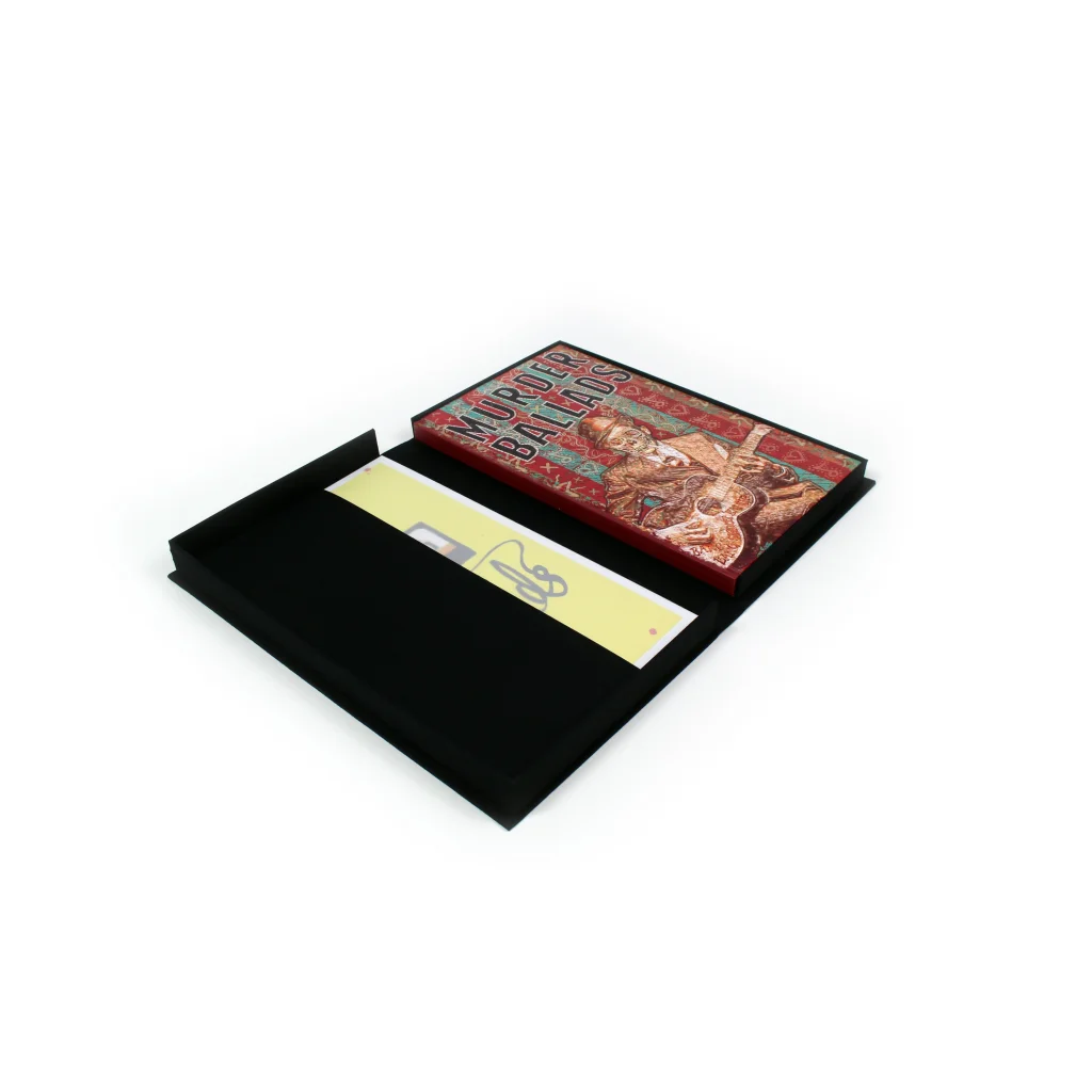 Black box set with Murder Ballads graphic novel, colorful cover, signed yellow slip