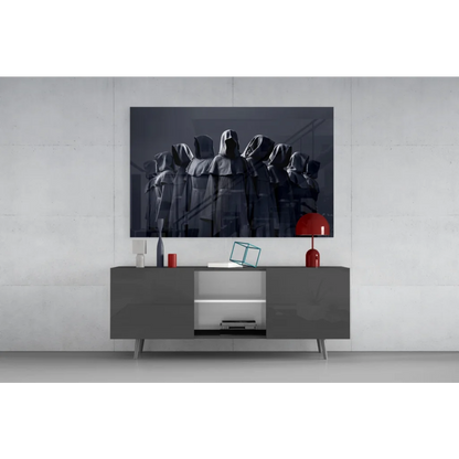 Mysterious black hooded cloak wall art print on modern gray TV stand