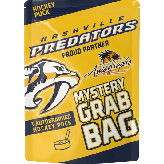 Nashville Predators autographed hockey puck mystery grab bag in yellow and navy blue