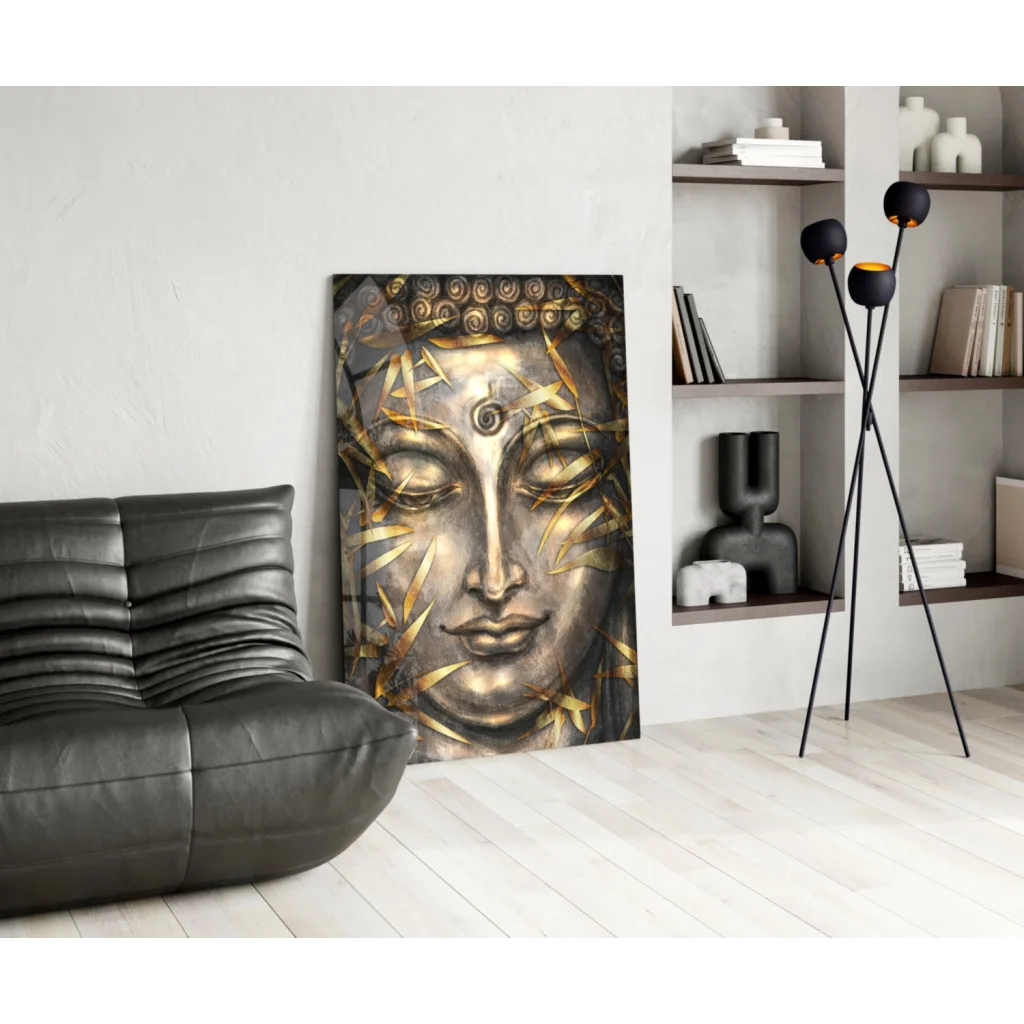 Golden Buddha face wall art with bamboo leaves in modern living room