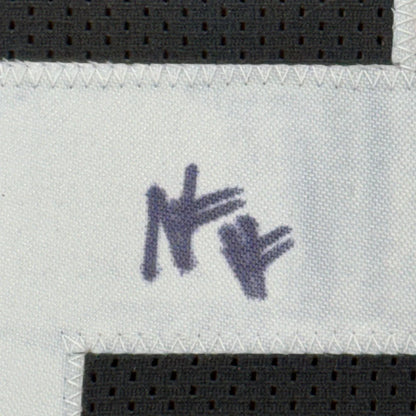 White fabric with a purple NY logo on Najee Harris Steelers jersey for your man cave