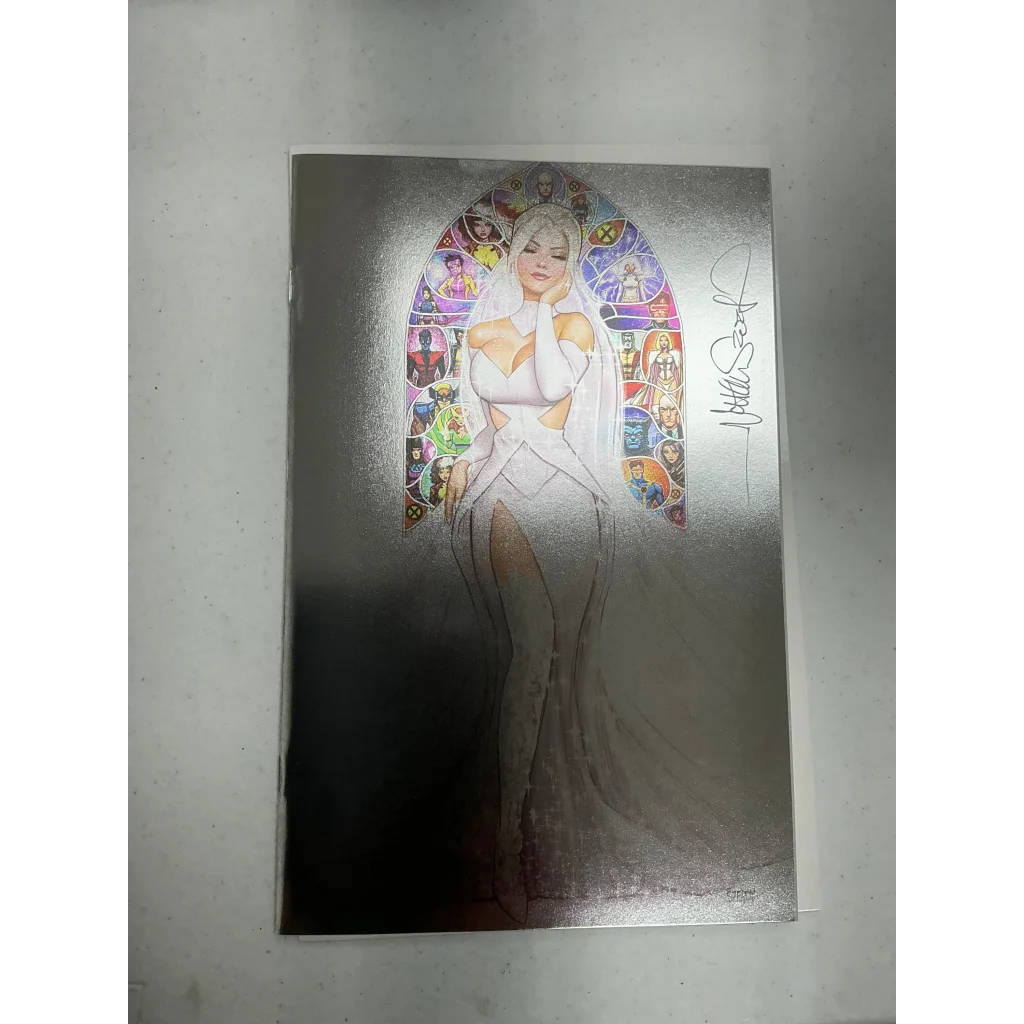 Nathan Szerdy signed Invincible Iron Man comic with female character in wedding dress