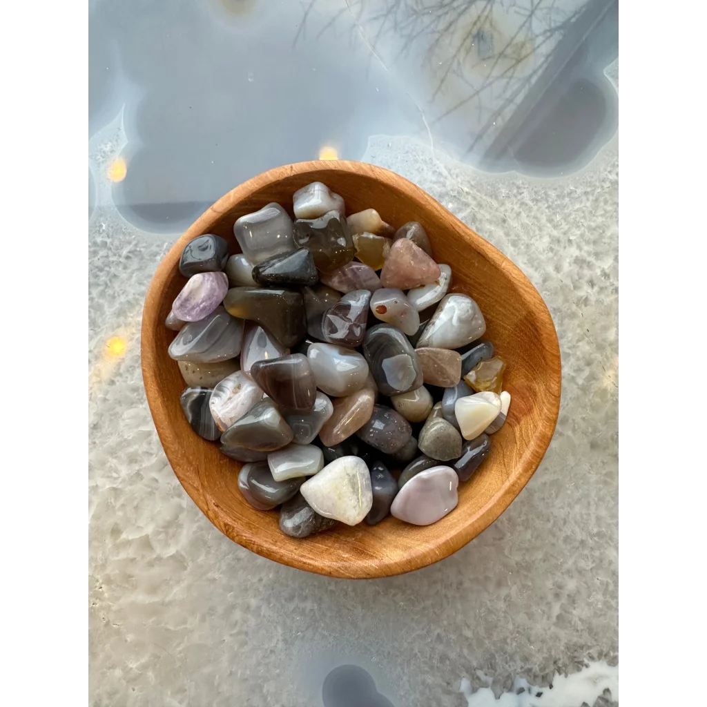 Natural agate tumbled stone collection in gray, black, white, pink tones