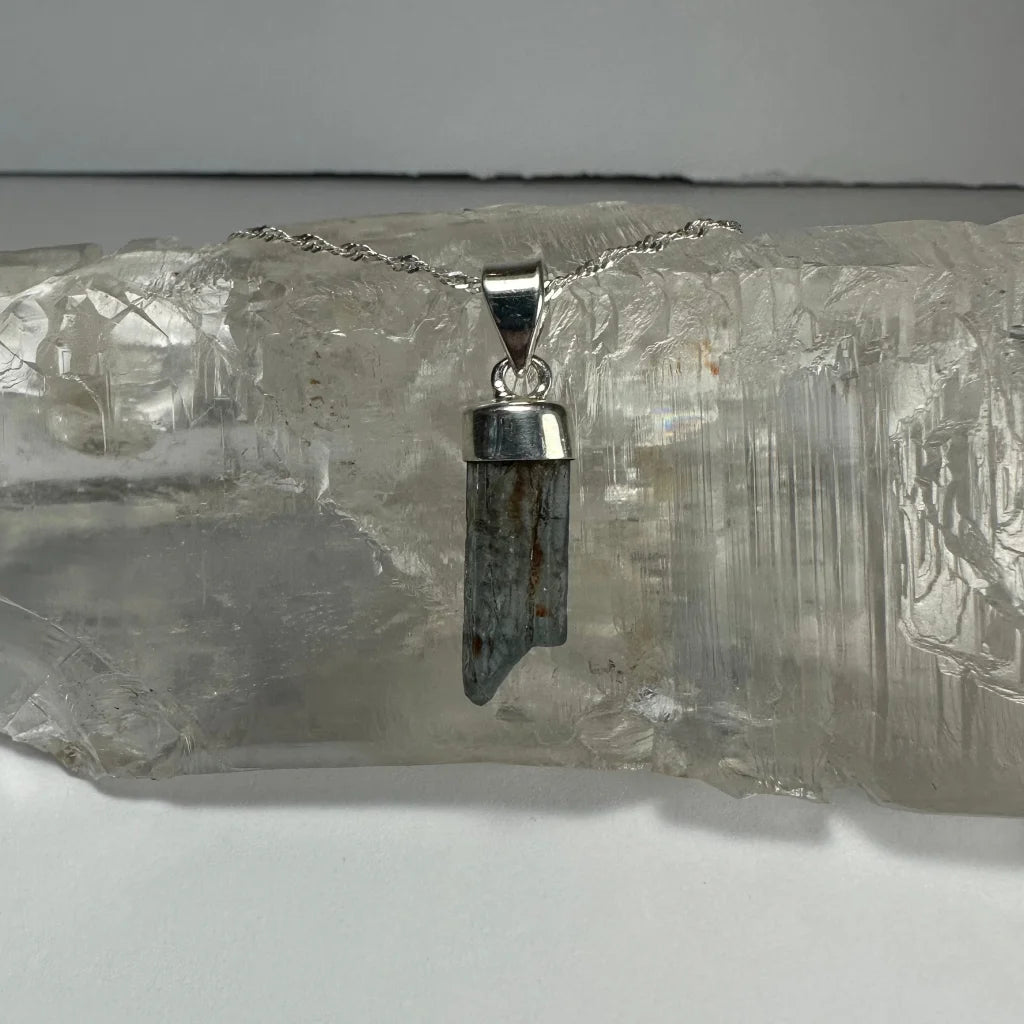 Natural aquamarine beryl sterling silver pendant with translucent crystal