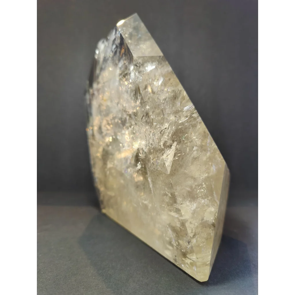 Natural citrine polished point weighing 4.1kg with translucent pale yellow quartz and internal crystalline inclusions