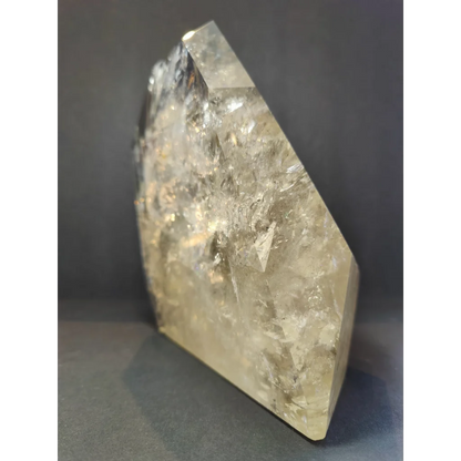 Natural citrine polished point weighing 4.1kg with translucent pale yellow quartz and internal crystalline inclusions