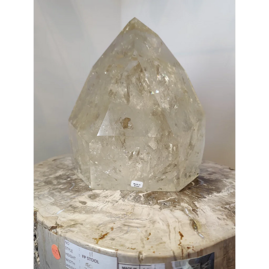 Natural citrine polished point 4.1kg featuring a translucent faceted quartz crystal with natural internal inclusions
