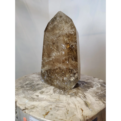 Natural citrine polished point 4.53kg with translucent golden-brown smoky quartz crystal and natural internal inclusions