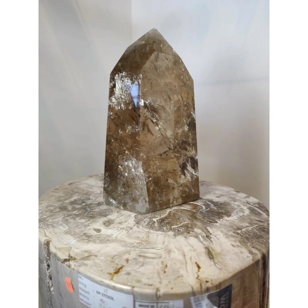Natural citrine polished point 4.53kg with tall faceted smoky quartz crystal and translucent brownish hue with inclusions