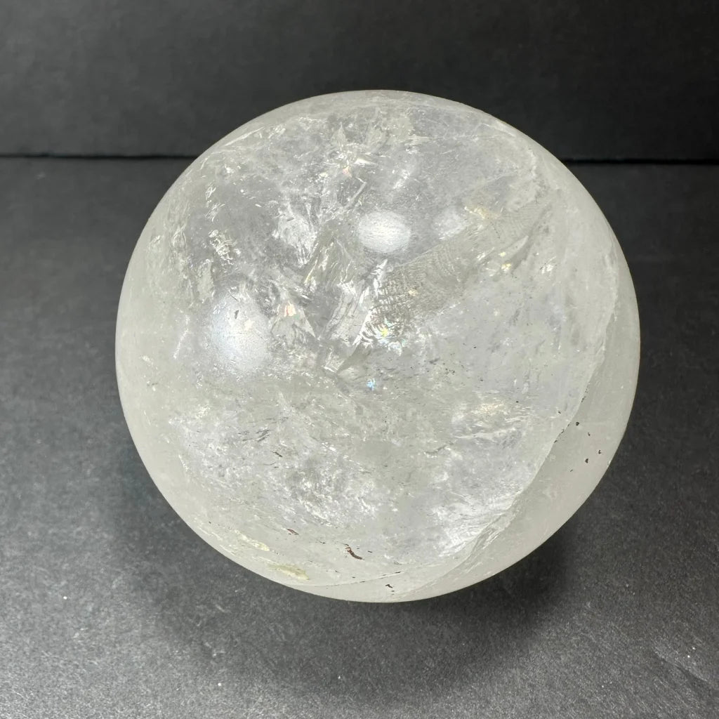 Natural clear quartz sphere with stunning crystal inclusions