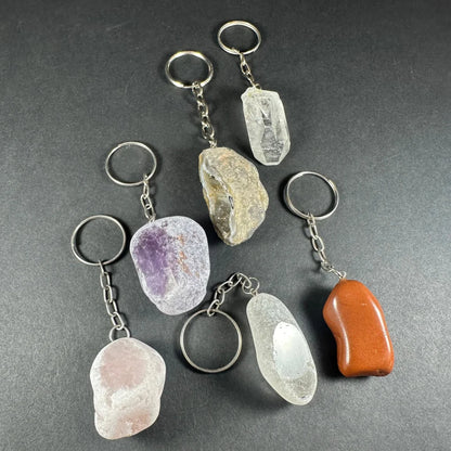 Six raw crystal keychains in quartz, amethyst, rose quartz, jasper hues