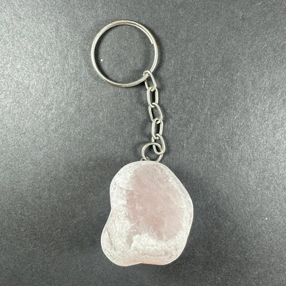 Smooth pink rose quartz crystal keychain with silver ring