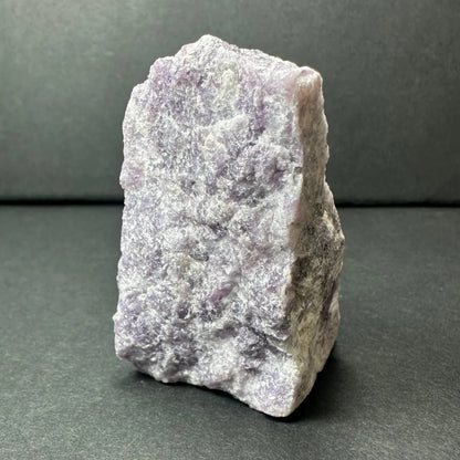 Rough purple lepidolite amethyst geode specimen with textured surface