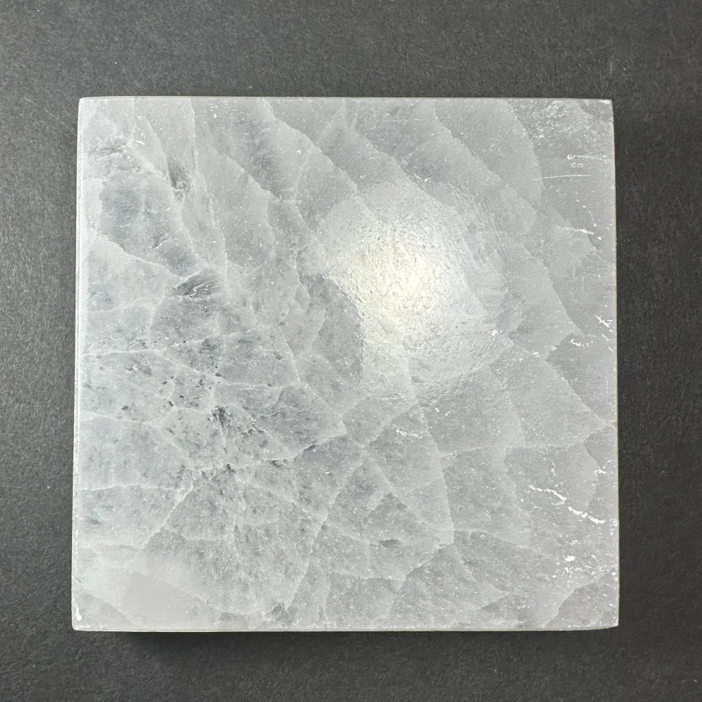 Translucent selenite slice with natural crystalline texture and veining