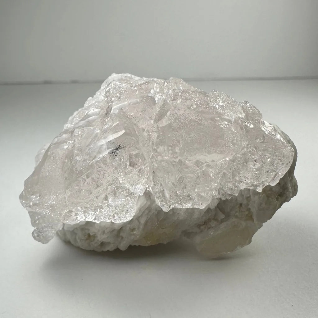 Naturally etched kunzite crystal with translucent quartz from Brazil and Afghanistan