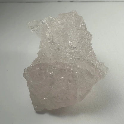 Naturally etched kunzite crystal with pinkish hue from Brazil and Afghanistan