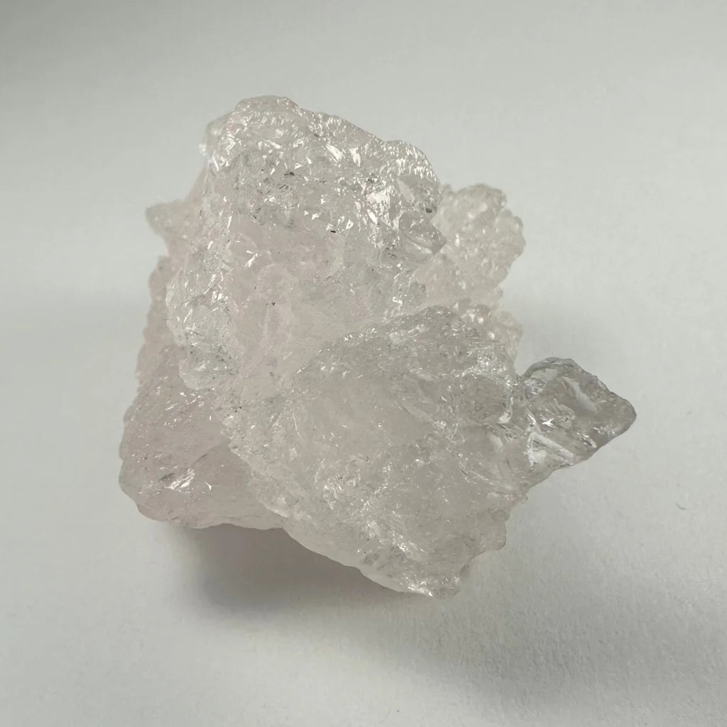 Naturally etched kunzite crystal with pinkish hue from Brazil