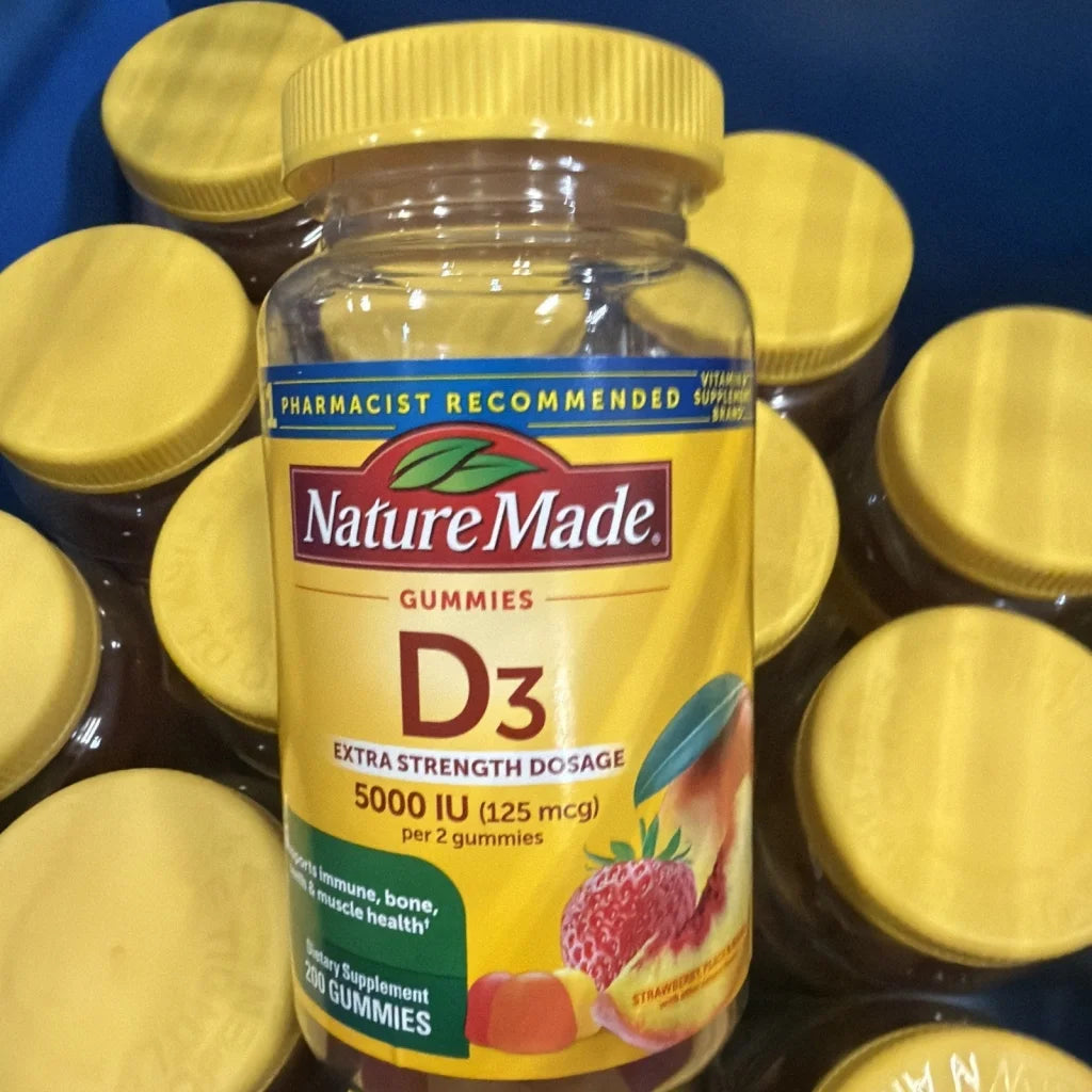 Nature Made D3 5000 IU gummies exp 05/2026 strawberry bottle