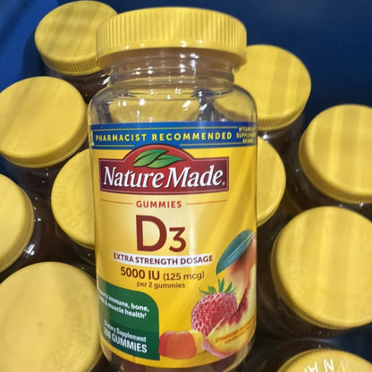 Nature Made D3 5000 IU gummies exp 05/2026 strawberry bottle