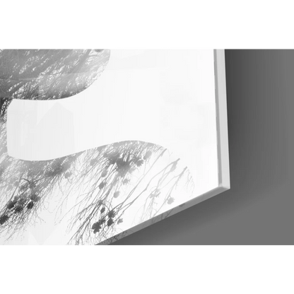 Minimalist black-and-white tree branches wall art on bright background