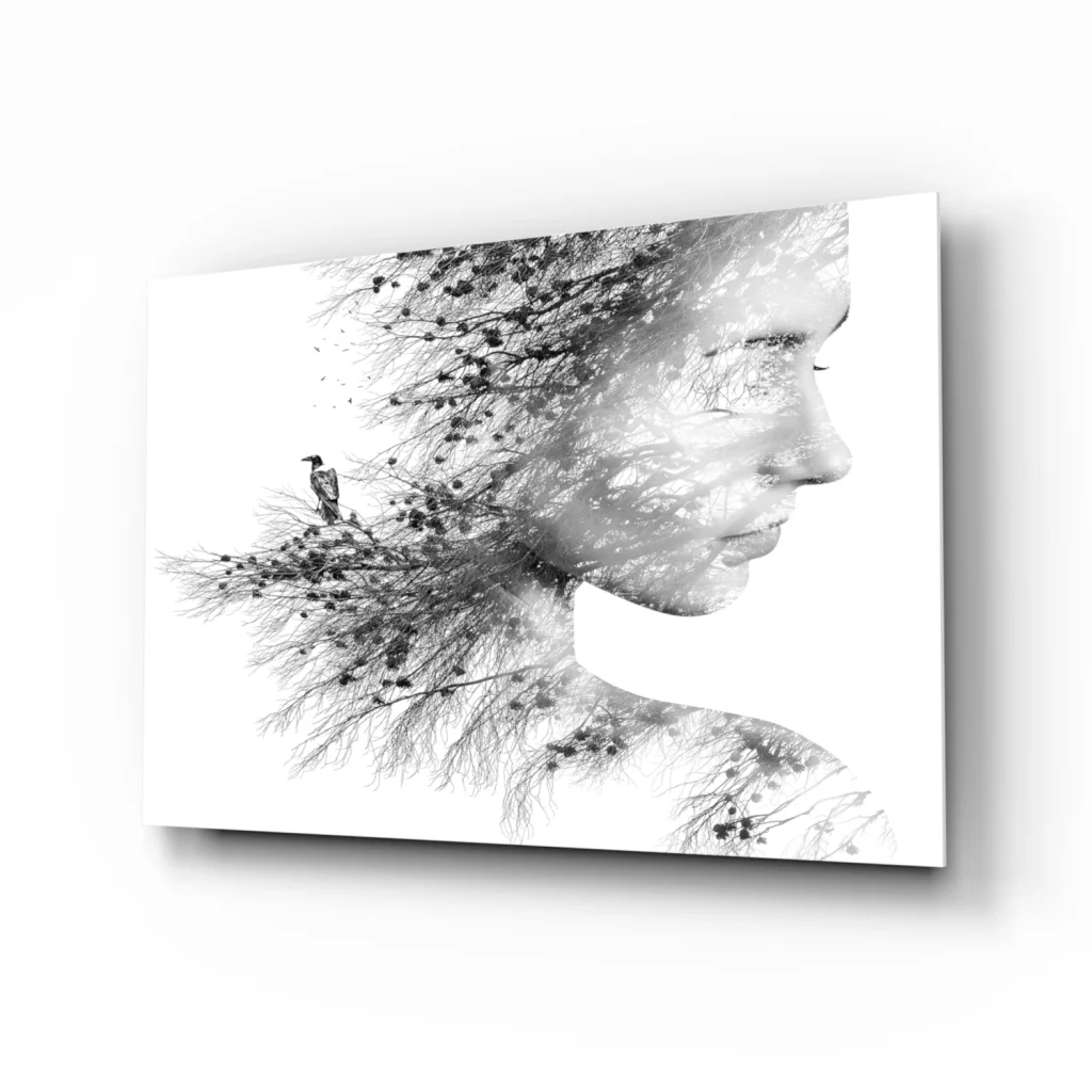Black-and-white double exposure wall art canvas print of womans profile with tree branches and bird