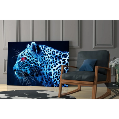 Vibrant blue glowing leopard wall art with red eyes canvas print