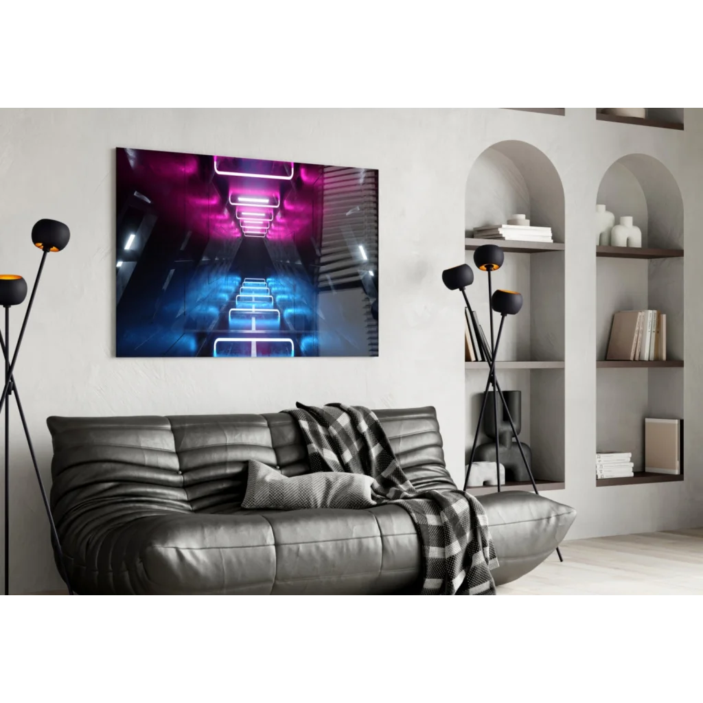 Black leather sofa with quilted texture and gray plaid throw